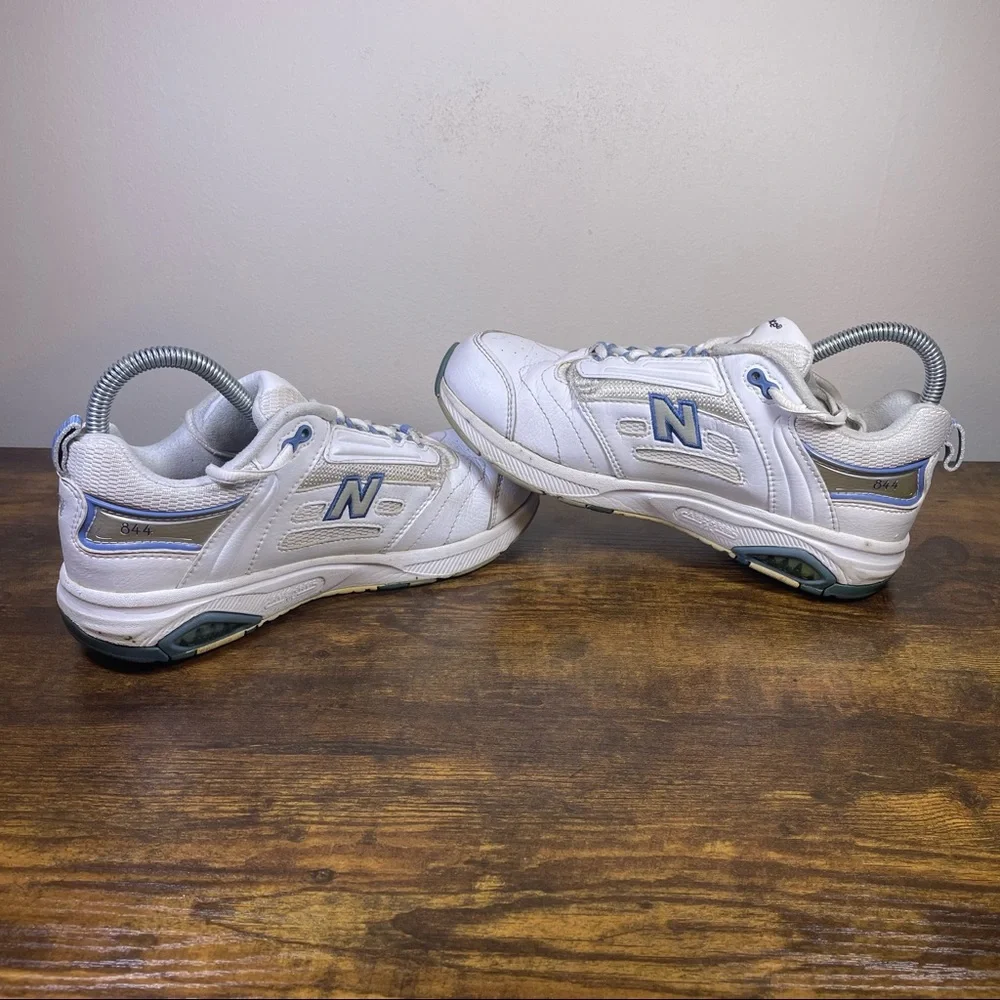 New Balance White Athletic Sneakers with Blue Accents
